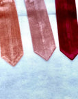Matching velvet necktie in wedding colors