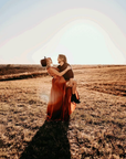 Custom velvet infinity bridesmaid dress with slit styling view